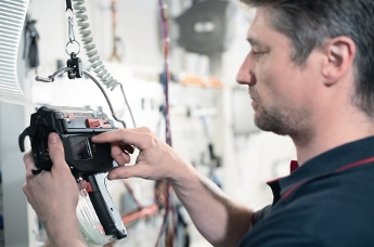 Automaattinen sidontajärjestelmä Autotool 2000